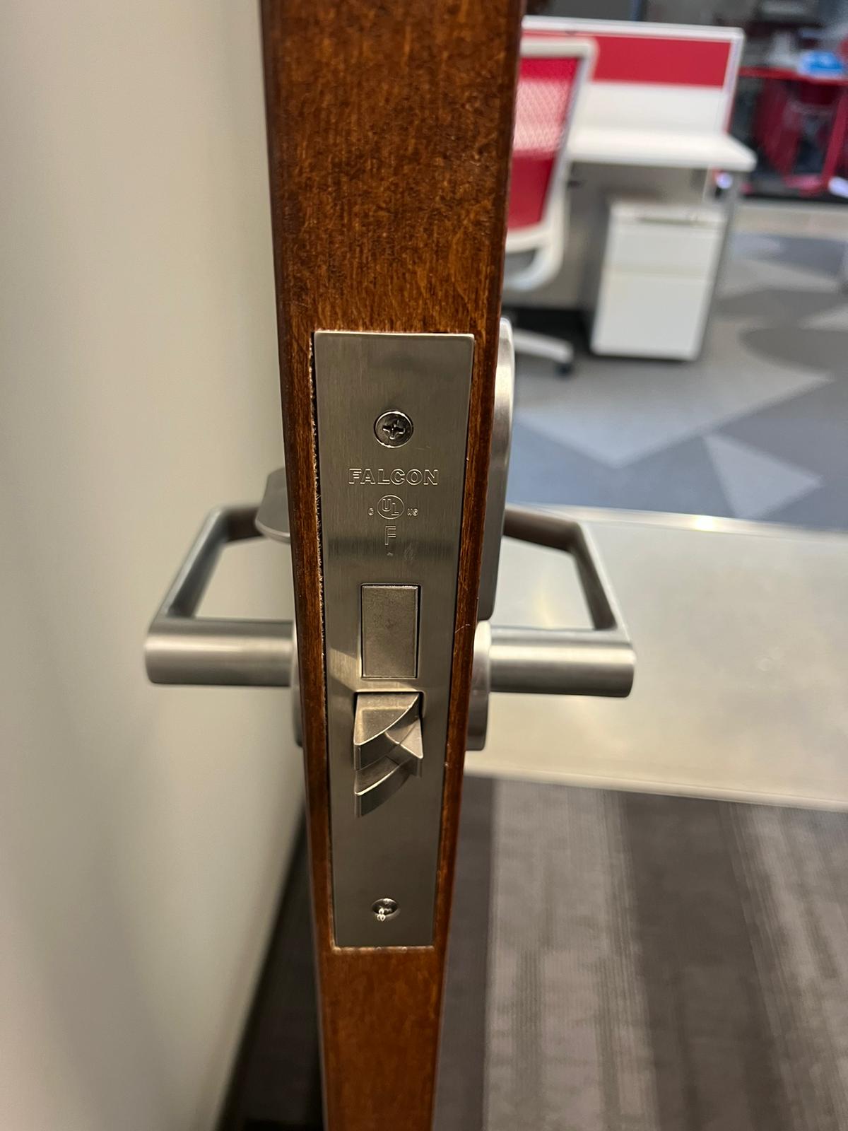 Commercial Install Hardware Classroom function lever handle and deadbolt installed on a school door