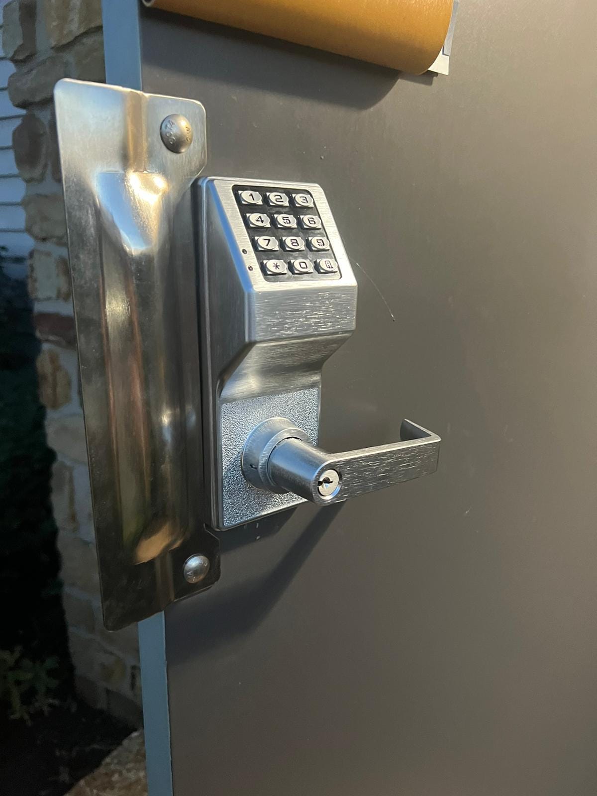 Commercial Install Hardware Digital keypad lock installed on a commercial door