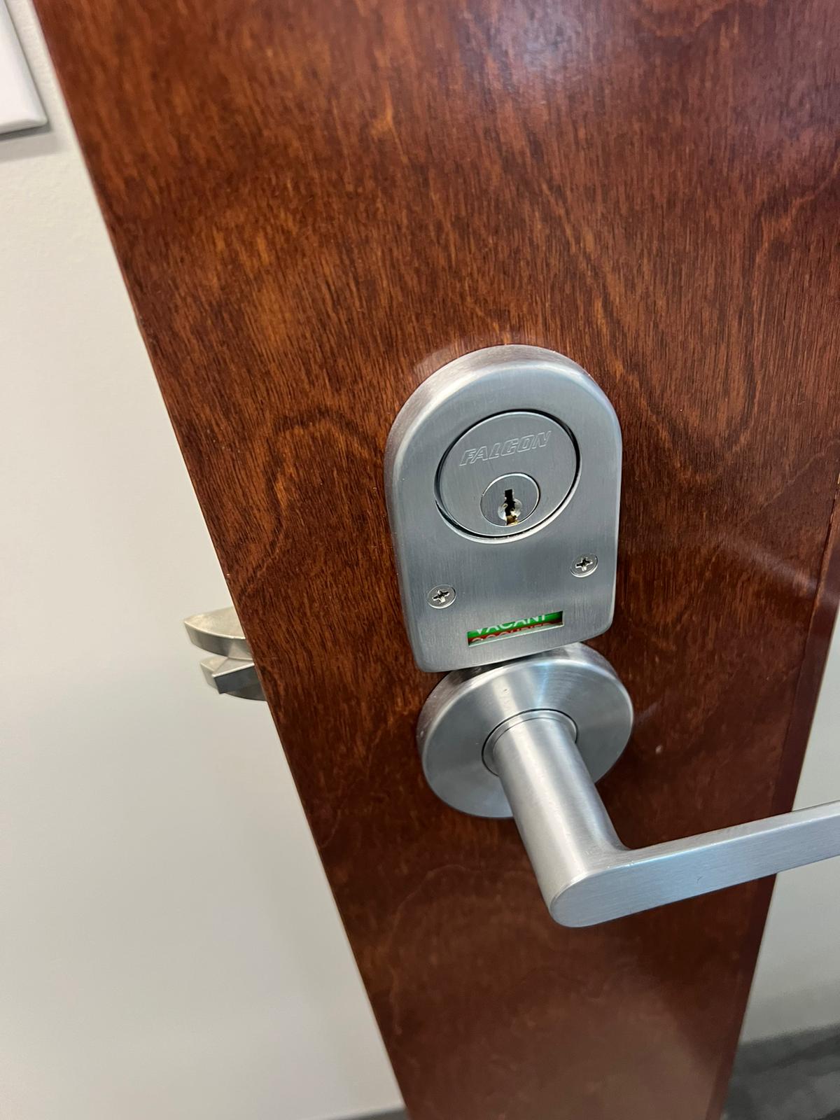 Commercial Install Hardware Commercial lever handle with a vacant privacy indicator