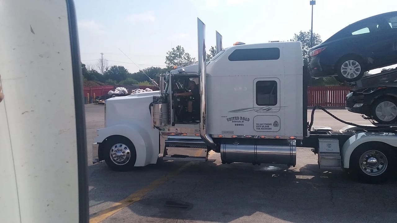 Locksmith Pro technician opening the locked door of a semi truck cab