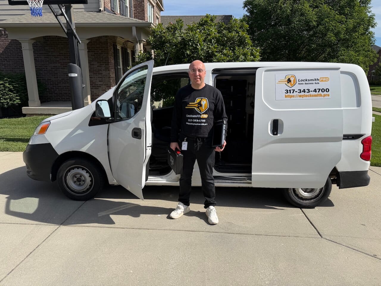 in front of the Locksmith Pro branded van