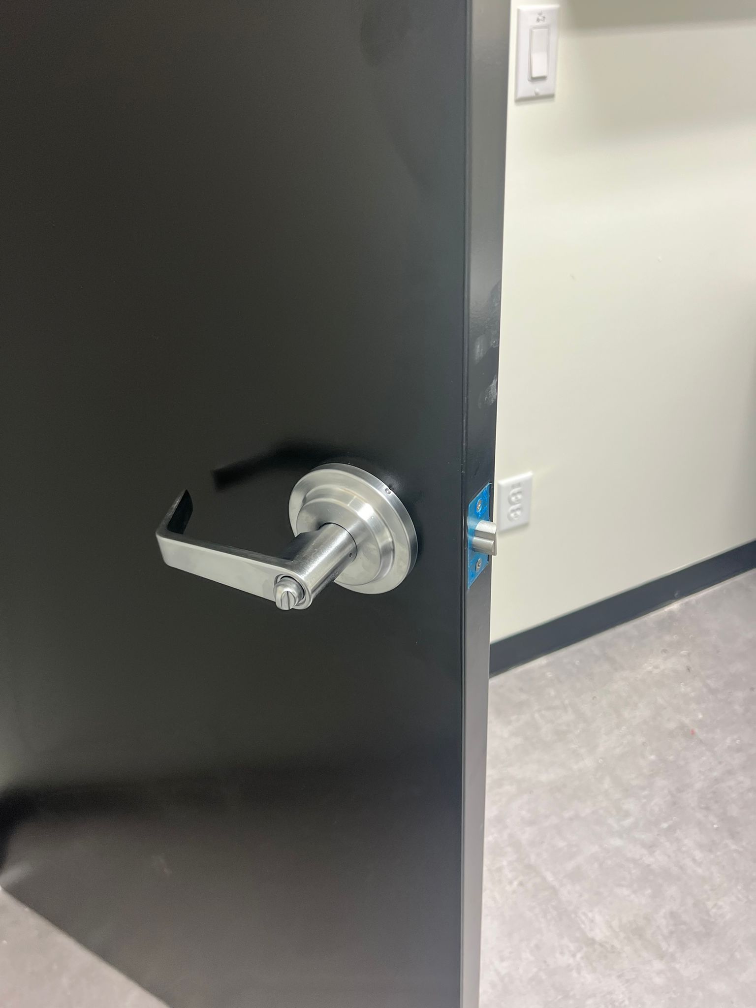 Commercial Install Hardware Heavy duty lever handle lockset installed on a warehouse door